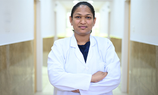 Dr. Karuna